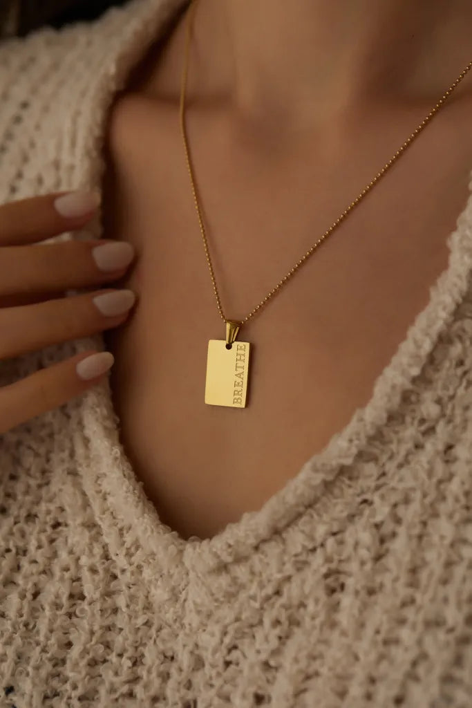 Halskette mit Aufschrift