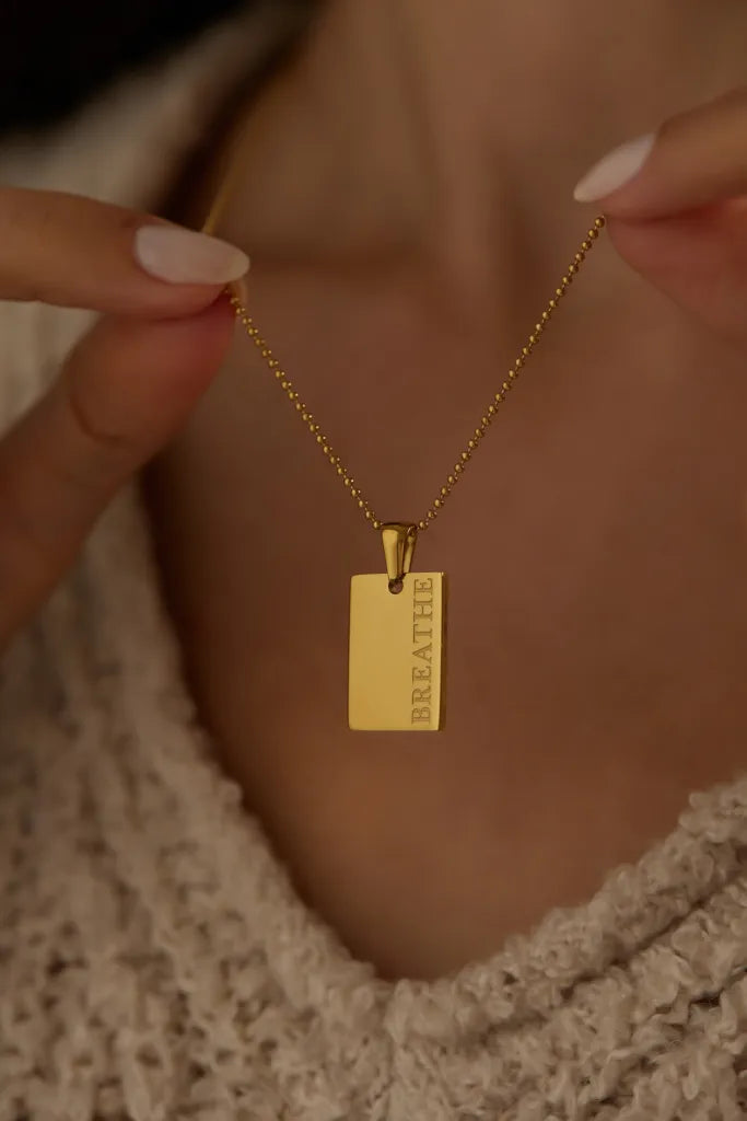 Halskette mit Aufschrift